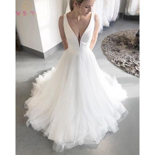 2019 New Simple Sexy V-Neck Wedding Dresses Boho A-Line White Ivory Sleeveless Beach Bridal Gowns Floor Length vestidos de noiva