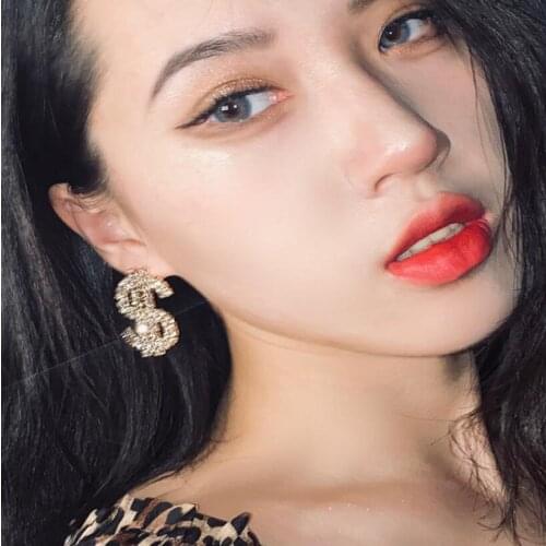 European and Korean version of fashion fashion rich little sister inset forceps dollar modelling earrings web celebrity personal