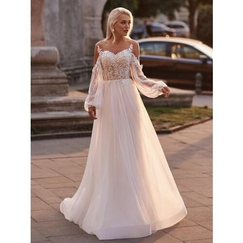 Illusion Neck Drop Long Sleeves Appliqued Wedding Gowns Beach Pearls Glitter Tulle Luxury Bridal Dresses Vestido De Noiva