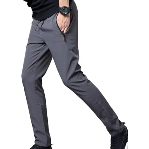 80%HOTMens sports pants training sports pants fitness pants solid color quick-drying drawstring ankle ties zipper pockets outdo