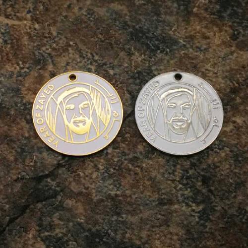 The logo of the Sheikh Zayed Superior quality Gold Color High Caless Rosary Muslim tassel