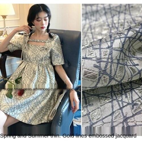 Elegant geometric three-dimensional embossed gold yarn yarn-dyed jacquard fabric, sewing fabric factory shop is not out of stock