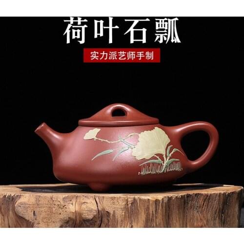 In rain, big red robe, mud-painted lotus leaf stone ladle pot, ball hole purple sand tea sets manufacturers wholesale