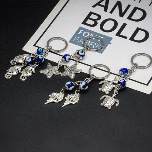 EVIL EYE Sea Turtle Starfish Charm Keychain Alloy Silver Color Ring Turkish Eye Key Chain Fashion Jewelry for Women Men EY6733