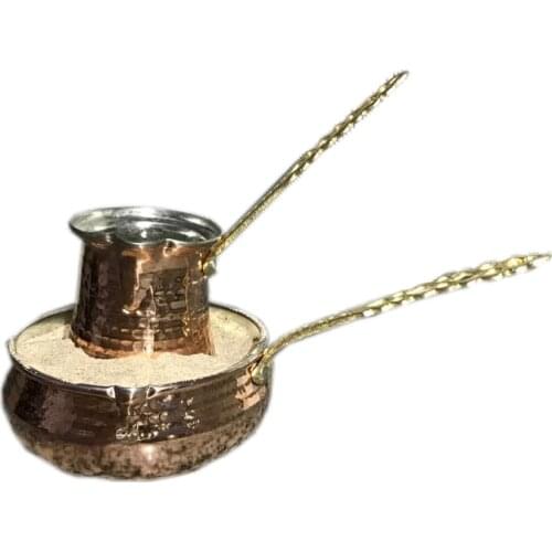 Making coffee in sand with coffee warmer turkish coffee maker turkish ottoman coffee sand coffee making coffee in copper sand