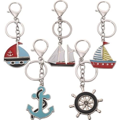 FREE shipping by FEDEX 100pcs/lot New Ship Rudder Keychains Metal Plane Keyrings Custom LOGO Key Chains Gifts