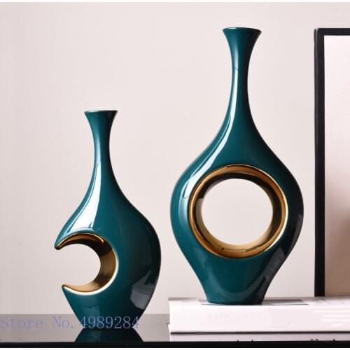 Ceramic vase Hollow golden abstract ceramic handicraft ornaments Flower Arrangement Hydroponics Home Decoration Flower vase