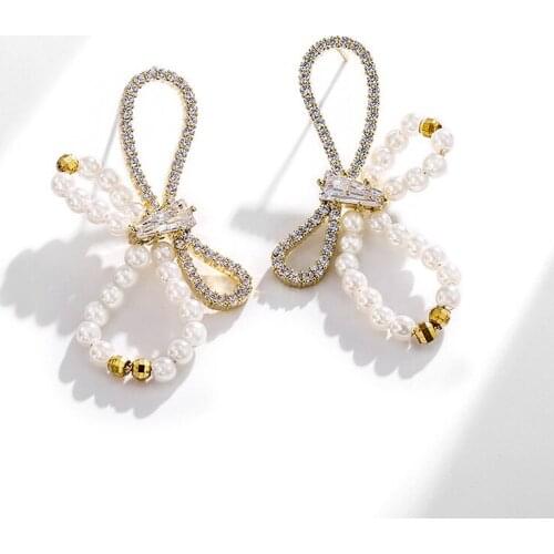 Lovely And Sweet Bow Imitation Pearl Exaggerated Earrings Korean New Elegant Simple Party Dating Wild Ear Jewelry Female