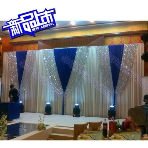 Romantic White Wedding Backdrop with royal blue drapes and silver sequin swags Wedding Stage decoration