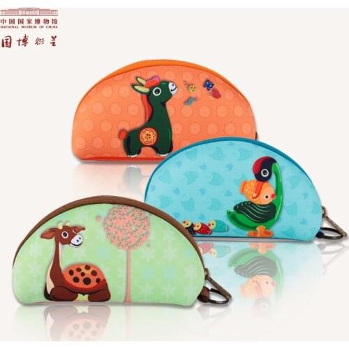 Set of NMC illustrated bags, including a jewelry case, cosmetics bag, wallet, pencil case, and handbag