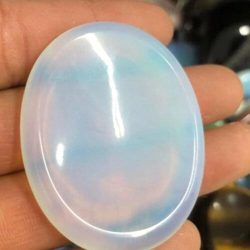 Natural opal thumb button carving quartz, used for processing Reiki processing