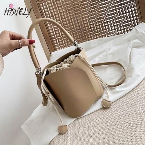 HISUELY Womens Casual Tassel Buckets Bag 2021 High Quality Lady Shoulder Bag High Quality PU Leather Handbags Designer Totes