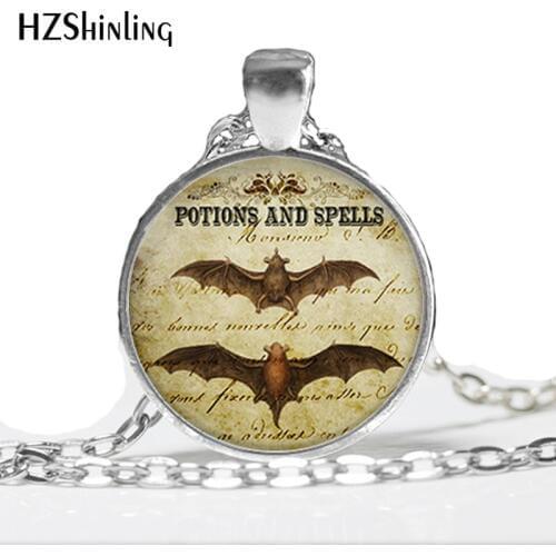 CR66-Bat Wing Potion Halloween jewelry charm, Halloween necklace, Bat jewelry, bat pendant bats glass photo cabochon
