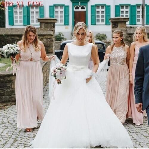 2020 Simple White A-line Wedding Dresses With Bow Tie Belt Backless Puffy Garden Bridal Dress Summer Tulle Wedding Gowns