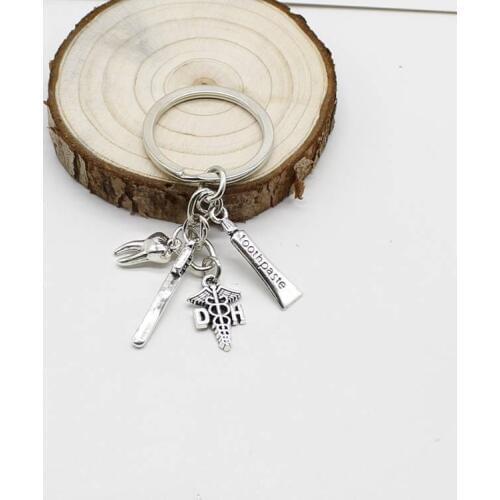 New dentist keychain dental assistant dental hygienist gift keychain to maintain oral hygiene personality keychain