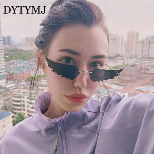 DYTYMJ Wings Lens Sunglasses Women Metal Rimless Sun Glasses Women Cat Eye Sunglasses Brand Designer Gafas De Sol Mujer 2020