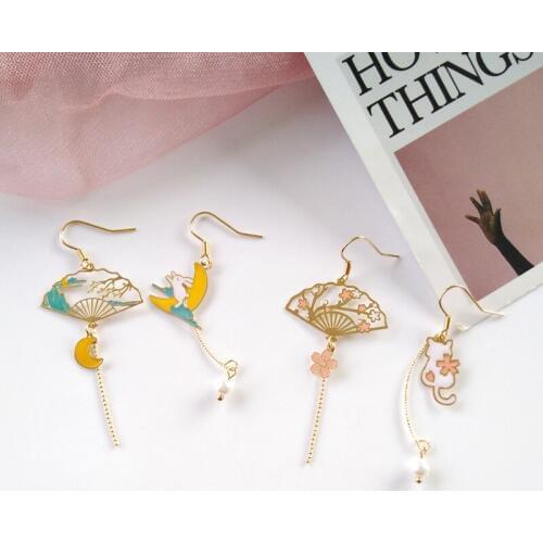 The new palace fan earrings retro national style temperament earrings asymmetric rabbit cute cat without pierced ears ear clip