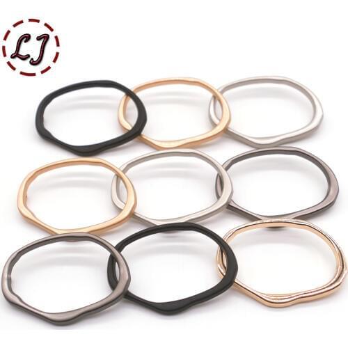 10pcs/lot high quality oval Hollow simplicity style metal sewing button garment accessory women overcoat decorative button DIY