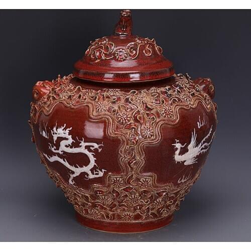 Yuan Dynasty Red Glazed Hand-knocked Flower Pile Carved Dragon and Phoenix Pattern Dog Jar