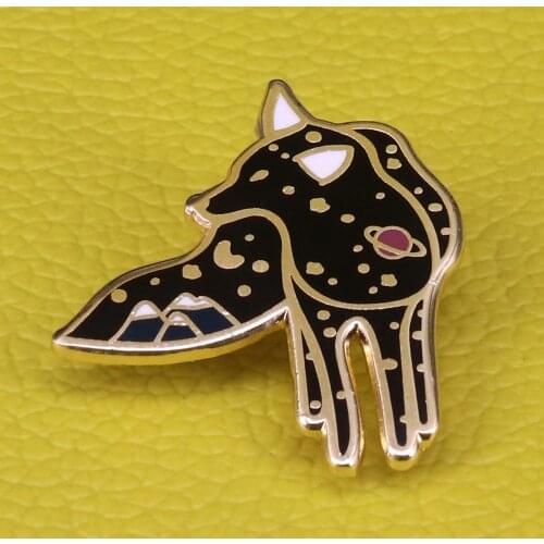Cosmic fox brooch Filled with moon stars and planets, seems to represent the wild nature of universe itself, vast and mysterious