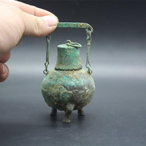 Collection of old Chinese bronzes, retro Han dynasty utensils, pots with beams, three-legged small ornaments
