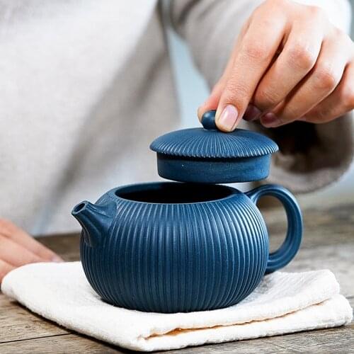 Yixing Teapot Purple Clay Herbal Tea White Infuser Teapots Oolong Jasmine Samovar Tetera Ceramica Kitchen Supplies EH60TP