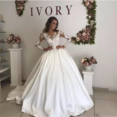 Princess Sheer Lace Long Sleeve Wedding Dress V Neck Satin Ball Gown Long Train Custom Made Bridal Gown 2021