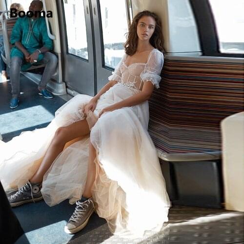 Booma 2021 Scoop Boho Wedding Dresses Short Sleeves Lace Appliques Beach Bride Dresses Open Back A-Line Tulle Wedding Gowns