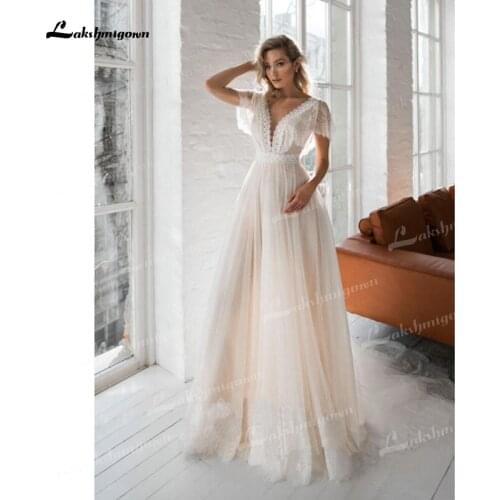 Exquisite A-line Wedding Dresses Dot Tulle & Lace Low V-Neck Illusion Cap Short Sleeves Open Back Sweep/Brush Train Bride Gowns