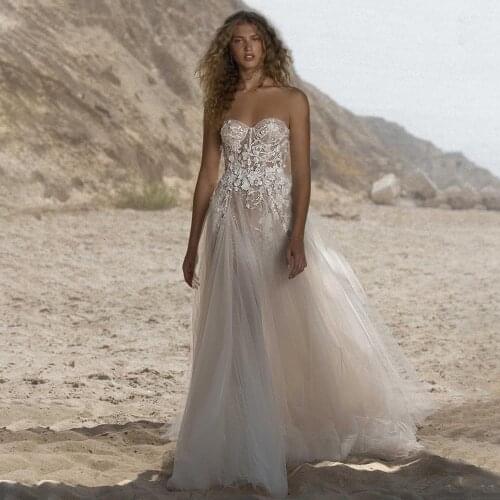 Fairy Beach Wedding Dresses Sweetheart Lace Appliques Illusion Long Bride Dresses Open Back 2021 A-Line Bridal Gowns