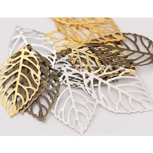 50pcs Craft Hollow Leaves Pendant Jewelry Accessories Gold Charm Filigree Jewelry Making Plated Vintage for Hair Comb Hot New