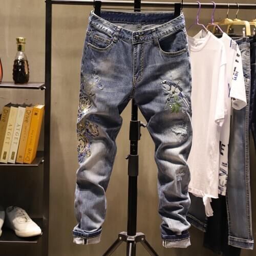 Autumn 2020 brand teenagers mens embroidered flower ripped stretch jeans mens Korean style trendy slim-fit cowboy pencil pants