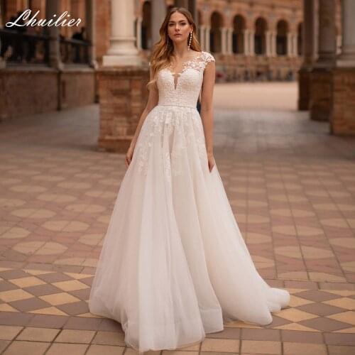 Lhuilier A-line Scoop Neck Beaded Tulle Wedding Dresses 2020 Floor Length Sleeveless Lace Appliques Bridal Dress with Belt