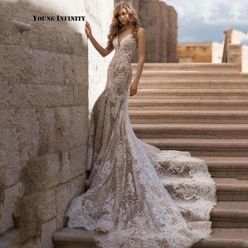 Elegant V Neck Champagne Mermaid Lace Wedding Dresses 2021 Sexy Spaghetti Straps Open Backless Beaded Appliques Long Bridal Gown