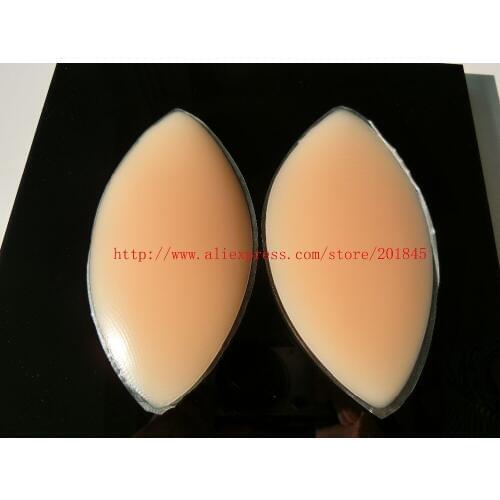 1 pair good medical silicone, anti chest expansion football shape stand chest pad inserts 76.5g