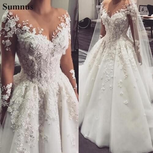 Sumnus Arabic Wedding Dresses 2021 Long Sleeves Lace Appliques 3D Flowers Beaded Plus Size Tulle Bridal Gowns