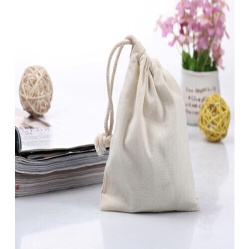 100pcs/lot free shipping cotton jewelry pouches high quality gift drawstring toiletry makeup packing and storage bags