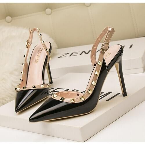 Rivet hollow female sandals 10CM PUMPS Simple and fashionable sexy nightclub stiletto high heel shallow mouth pointed