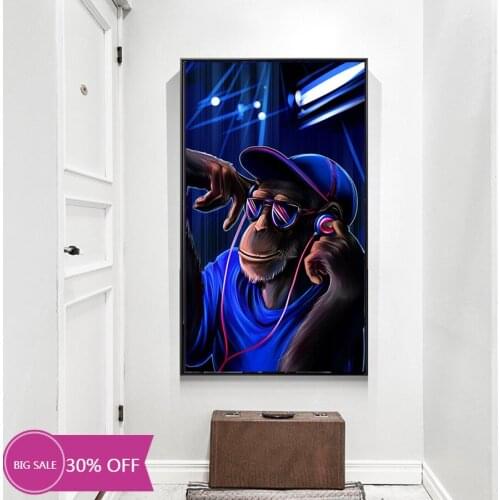Canvas painting monkey with headphones listening to music. Art posters and pictures for decorating the living room