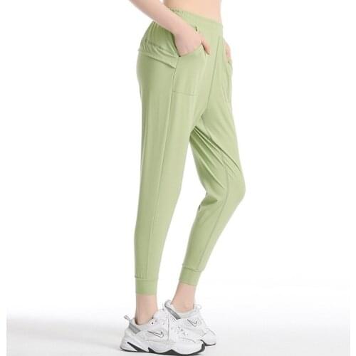 High Quality Hot Sale Yoga Pants With Pockets Loose Comfortable Seamless Sports Pants Running Athletic Trousers For Women