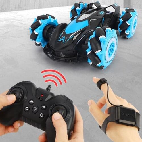 D885 1:14 2.4G 4WD Remote Control RC Stunt Car Cross Spray Deformation Twist Gesture Radio Sensing Drift Vehicle Music Light