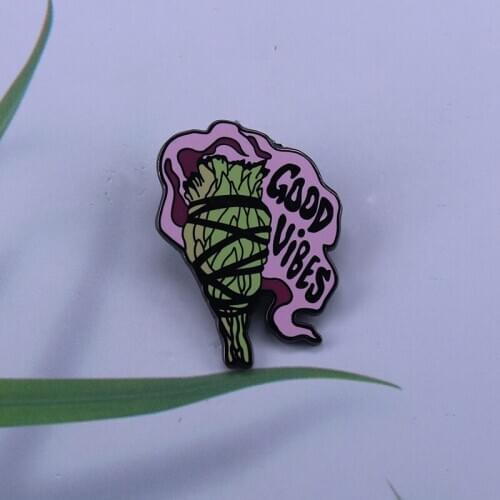The Good Vibes Sage pin will keep the good vibes going strong wherever you go