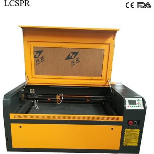 Reci W2 CO2 100W 9060 laser cutting machine with Ruida control mainboard and 600*900mm auto up and down honeycomb table