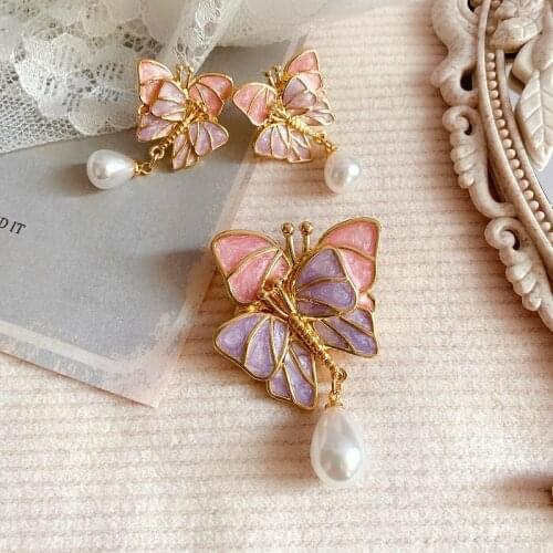 Gentle warm tone pearl enamel light luxury temperament exquisite Butterfly Brooch 925 silver needle Earrings female