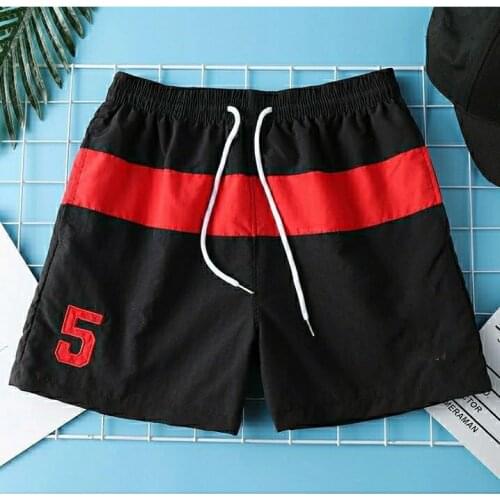 Casual sports shorts mens trend fashion tether inner mesh stitching straight loose plus size fat shorts men summer beach pants