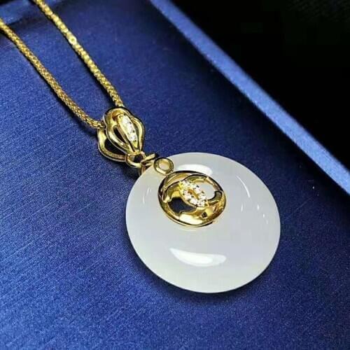 Natural Hetian jade S925 silver thick gold plating inlaid with white jade safety buckle Pendant