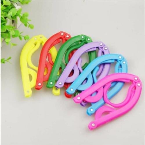 1PCS Travel Clothes Hanger Portable Folding Clothes Hanger Multifunction Magic Stretch Drying Rack Home Wardrobe Storage Rack