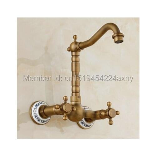 Free Shipping European Antique Brass Finish with ceramic Wall Mount Kitchen Faucet Mixer Swivel Spout Hot Cold Water tap GI88