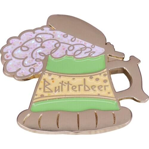 A foaming tankards of this popular wizarding beverage pin taste like less-sickly butterscotch big mug symbol emblem brooch