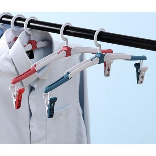 2021 New Travel clothes hanger Portable Folding Clothes Hanger Multifunction Stretch Drying Rack Home Wardrobe Storage Rack